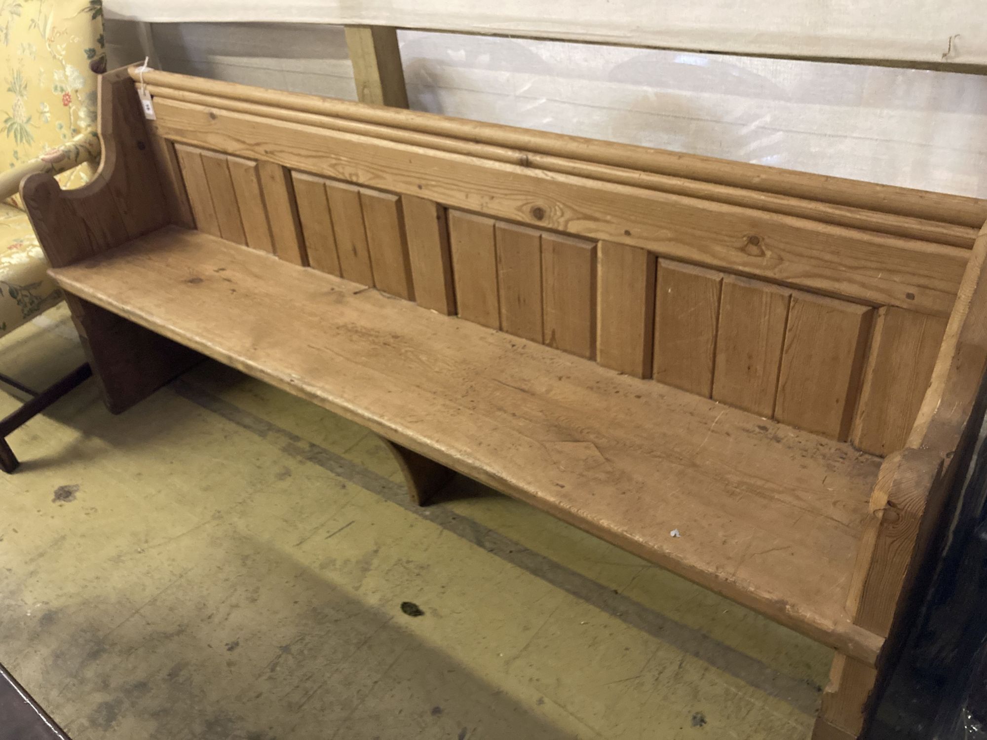 A Victorian stripped pine pew, length 194cm, depth 50cm, height 81cm